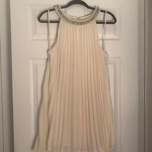 En Crème Dress with Embellishments